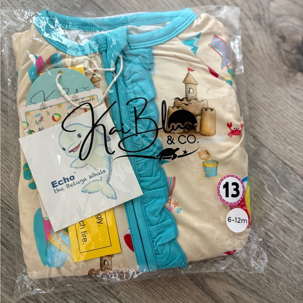 NWT Kai Blue Beach Ruffle Zippy 6-12M